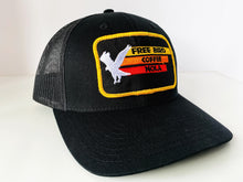 Load image into Gallery viewer, All black mesh trucker snapback hat with vintage flying eagle free bird coffee logo, best damn coffee in the world
