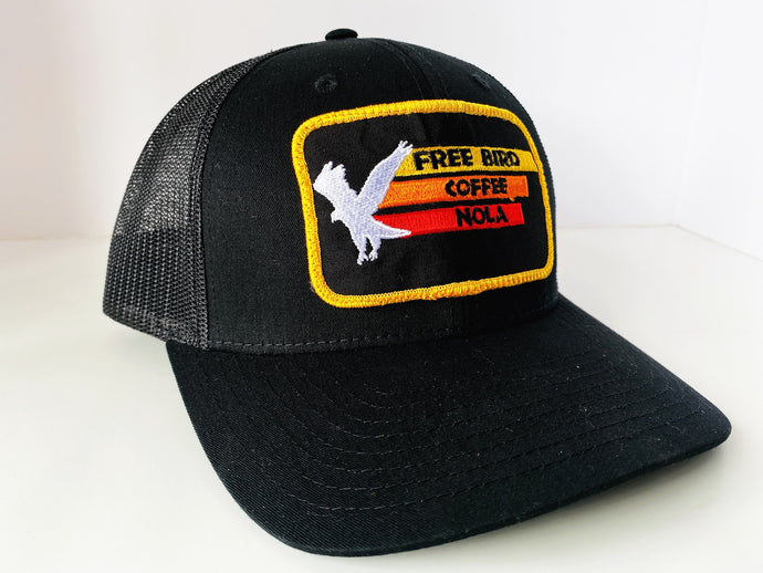 All black mesh trucker snapback hat with vintage flying eagle free bird coffee logo, best damn coffee in the world