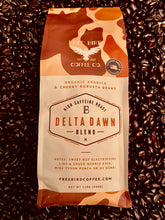 Load image into Gallery viewer, high caffeine coffee, smooth coffee with a kick, robusta beans with twice as much caffeine as arabica beans, delta dawn is free bird coffees high caffeine coffee, vintage duck camo bag design, delta dawn is like a jordan dunk, chuck norris, kick or a mike tyson punch
